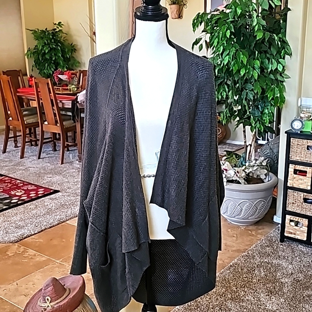 Sweater cardigan soft materials .
